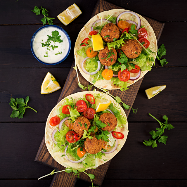 tortilla-wrap-with-falafel-fresh-salad-vegan-tacos-vegetarian-healthy-food-top-view